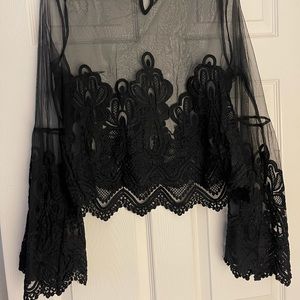 Missguided sheer black bell sleeve top